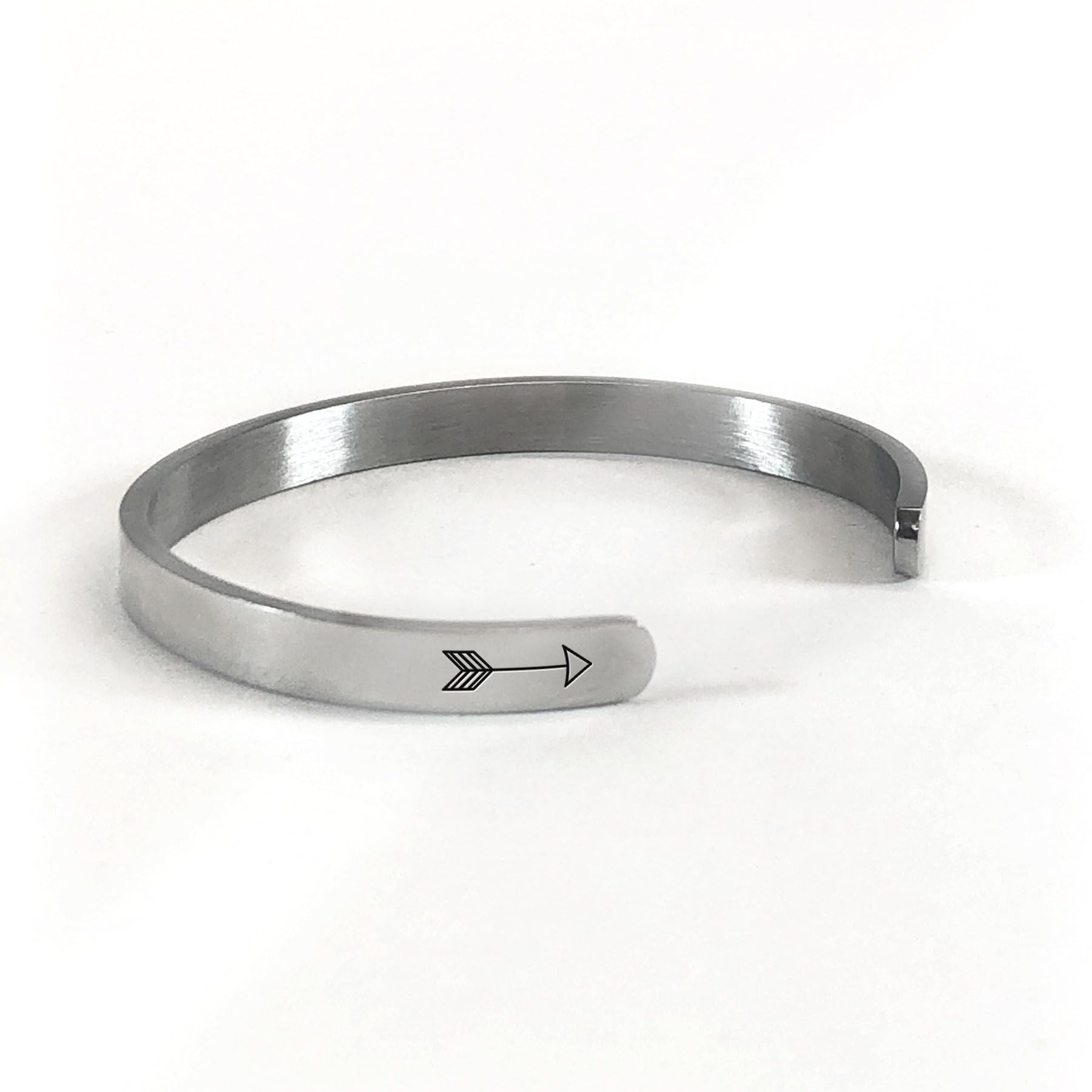 Home is where your mom is bracelet in silver rotated to show arrows and cuff opening