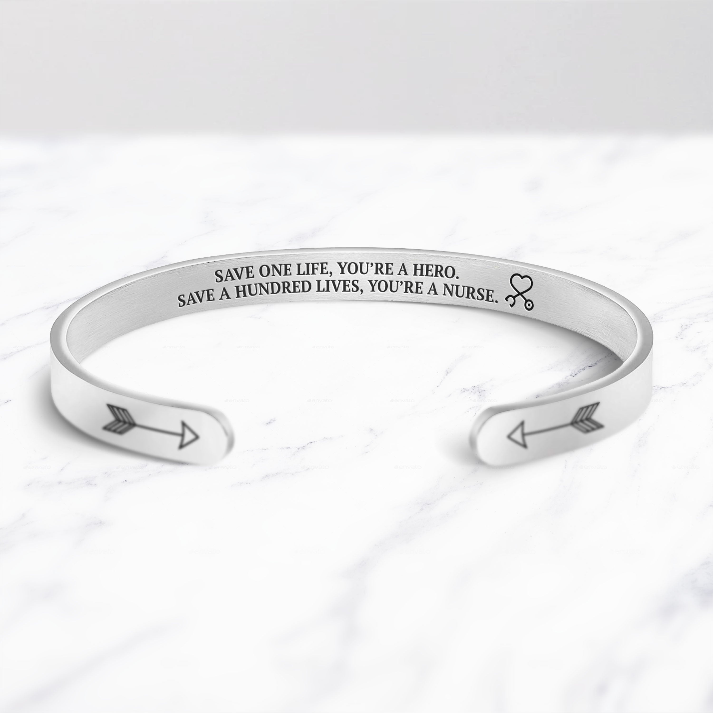 Save a hundred lives, You're a nurse Cuff Bracelet bracelet with silver plating on a marble background 